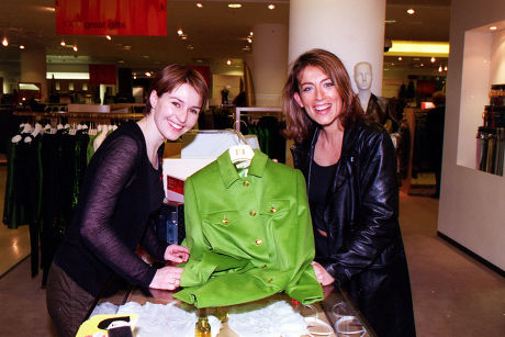 Helen Baxendale Takes Her Purchase To The Till Which Is Being Looked After By Faye Ripley At A Selfridges Celebrity Shopping Evening On Behalf Of The Terrence Higgins Trust.