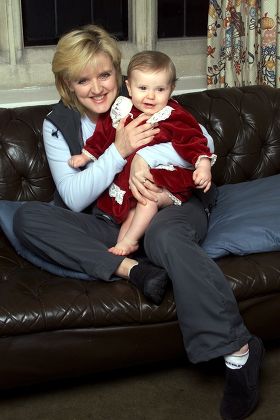 Former Singer With Family Pop Group The Nolans Bernadette Nolan. Bernadette Is Now Appearing In Musical 'blood Brothers' At Chichester Festival Theatre. Picture Shows Her At Home With Her 9-month-old Daughter Erin.