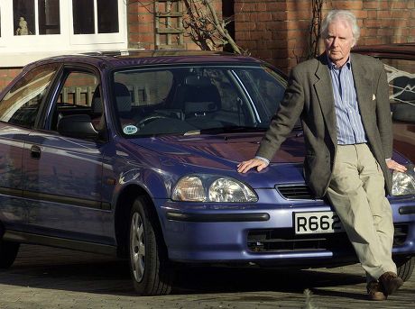 Art Critic Brian Sewell Pictured With His Car.