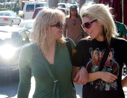 Courtney Love arm in arm with female friend in West Hollywood, Ca, California, USA - 01 Nov 2004