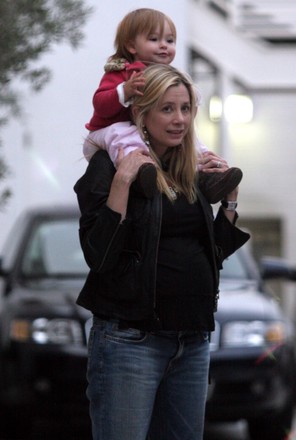 EXCLUSIVE: Mira Sorvino carries daughter Mattea Angel on her shoulders in Beverly Hills, Ca, California, USA - 31 Mar 2006