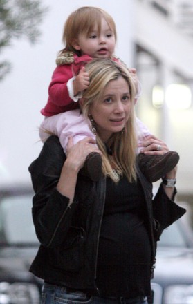 EXCLUSIVE: Mira Sorvino carries daughter Mattea Angel on her shoulders in Beverly Hills, Ca, California, USA - 31 Mar 2006