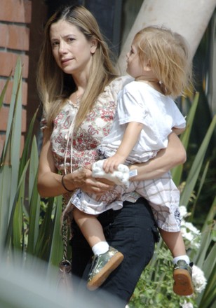 Mira Sorvino's young son does not seem to be too happy, Brentwood, California, USA - 14 Aug 2008