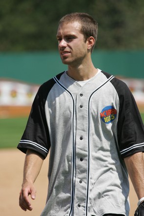 Sebastien Lefebvre of Simple Plan plays in a charity softball game against Simple Plan and the radio station KISS 103.5fm Chicago at Alexian Field in Schaumburg, IL.