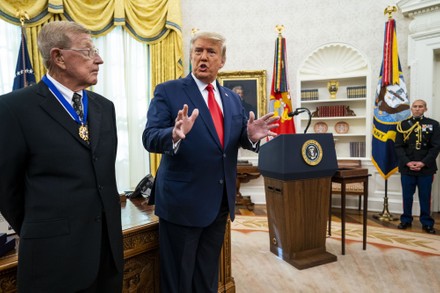 President Trump presents the Medal of Freedom to Lou Holtz at the White House, Washington DC, USA - 07 Dec 2020