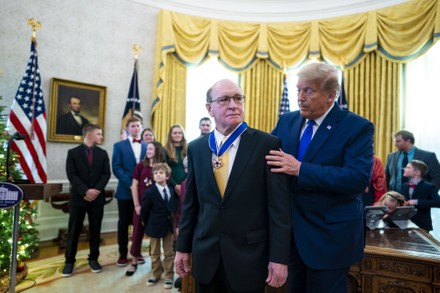 President Trump presents the Medal of Freedom to Lou Holtz at the White House, Washington DC, USA - 07 Dec 2020