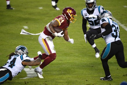 Washington Football Team running back Antonio Gibson (24) runs