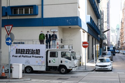 Hong Kong activists call for release of 'political prisoners' from atop van on New Yearís Day in China - 01 Jan 2021