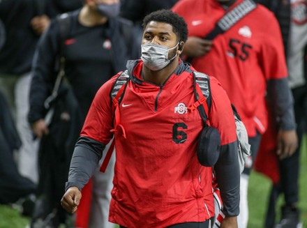 January 1, 2021: Clemson defensive back Andrew Booth Jr. (23) tries to  bring down Ohio State receiver Chris Olave (2)during the Allstate Sugar  Bowl Classic Playoff Semifinal game between the Clemson Tigers