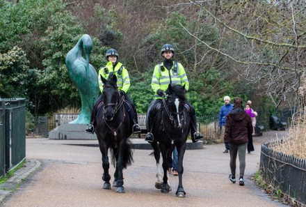 Police keep up patrols in Hyde Park in London as Home Secretary warned that there will be tougher enforcement of covid-19 rules, London, UK - 19 Jan 2021