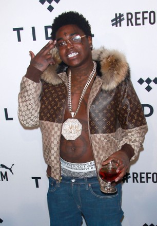 Lil Wayne wears Louis Vuitton Belts