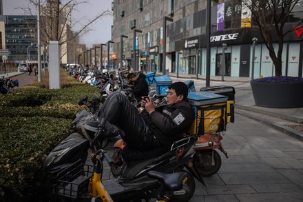Daily life in Beijing, China - 16 Mar 2020