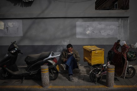 Daily life in Beijing, China - 16 Mar 2020