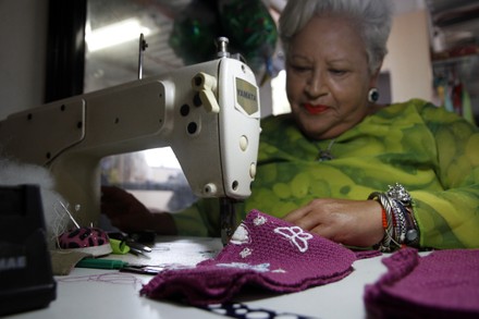 The fashion designer, Irma de la Parra, manufactures a teddy bear made with  the garments of a victim, who lost the battle against Covid19, 250 teddy  Bears of Remembrance have been delivered.