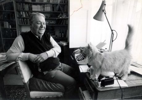 Kingsley Amis Author. Pictured In His Home With His Cat Sarah. Pkt2025-141488