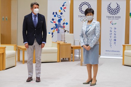 Lord Sebastian Coe President of World Athletics (L) and Tokyo Governor Yuriko Koike (R) poses for photographers before a meeting