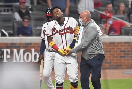 May 08, 2021: Atlanta Braves infielder Pablo Sandoval celebrates as he runs  down the first baseline after hitting a game tying home run during the  ninth inning of a MLB game against