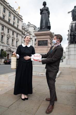 The Florence Nightingale Museum celebrates her 201st birthday with cake and flowers at the stautue in her honor in London, UK - 12 May 2021