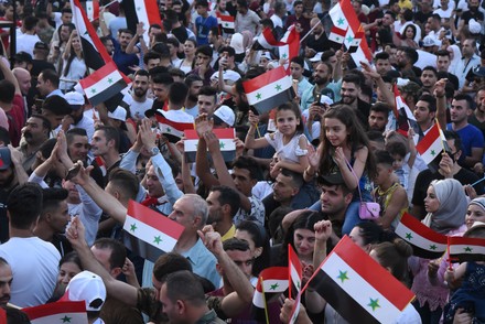 Supporters of Syrian President Bashar Assad celebrate his reelection, Damascuss, Syria - 28 May 2021
