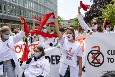 Doctors for Extinction Rebellion collective demonstrate outside WHO headquarters in Geneva, Switzerland - 29 May 2021