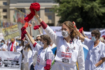 Doctors for Extinction Rebellion collective demonstrate outside WHO headquarters in Geneva, Switzerland - 29 May 2021
