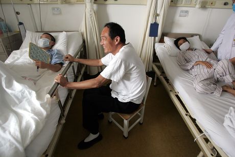 Woman finds adopted son's birth mother after 22 years to persuade her to donate to him one of her kidneys, Zhoukou, Henan province, China - 08 Jun 2010