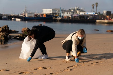 Environmental collective harbor clean up, Cape Town, South Africa - 12 Jun 2021