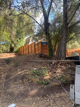 Patrisse Cullors erects fence around her home in Topanga Canyon, California, USA - Jun 2021