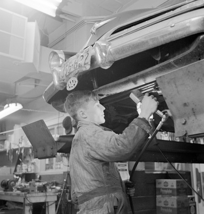 Teenage Garage Attendant Working Under Car Editorial Stock Photo ...