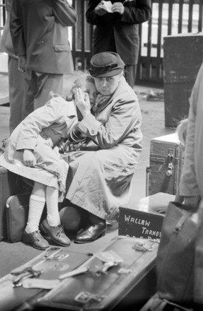 Immigrant Lady Sitting Child On Luggage Editorial Stock Photo - Stock ...