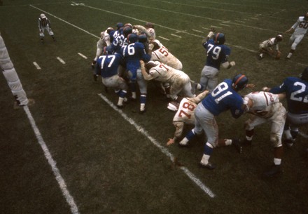 PRO FOOTBALL: In a game against the Redskins, Roosevelt "Rosey" Grier (#76), Robustelli (#81), and other Giants fight to block an extra point attempt by the 'Skins 6' 2", 230-lb. kicker and guard, Bob Khayat., USA