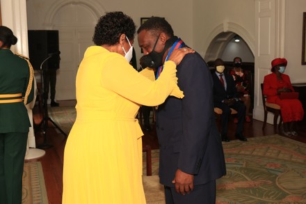 Sir Cuthbert Gordon Greenidge KCMG MBE knighted by Governor General Dame Sandra Mason, Wildey, Saint Michael, Barbados - 18 Jun 2021