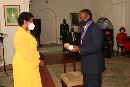 Sir Cuthbert Gordon Greenidge KCMG MBE knighted by Governor General Dame Sandra Mason, Wildey, Saint Michael, Barbados - 18 Jun 2021