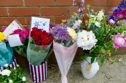 Floral tributes are left outside George Michael's former home Mill Cottage to mark what would have been his Birthday, Goring on Thames, Oxfordshire, UK - 26 Jun 2021