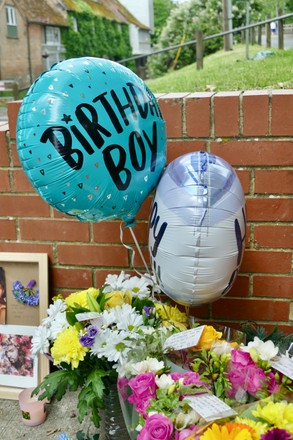Floral tributes are left outside George Michael's former home Mill Cottage to mark what would have been his Birthday, Goring on Thames, Oxfordshire, UK - 26 Jun 2021