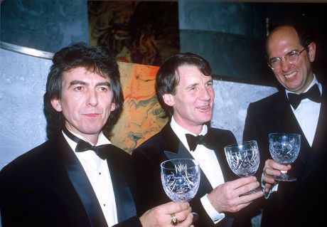 GEORGE HARRISON, MICHAEL PALIN AND DENIS O'BRIEN