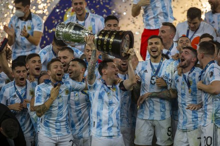 Rio De Janeiro, Brazil. 10th July, 2021. Lionel Messi and Argentina  celebrate with trophy after winning the final of Copa America 2021 a  football match between Argentina and Brazil 1-0 with the