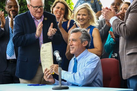 Delaware Governor John Carney signs Senate Bill 15, Wilmington, USA - 19 Jul 2021