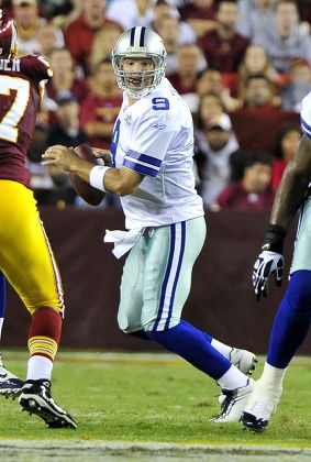 LeBron James tosses the football before the beginning of the game as the Dallas  Cowboys faced the Washington Redskins at FedEx Field in Landover, Maryland,  Sunday, September 12, 2010. (Photo by Ron