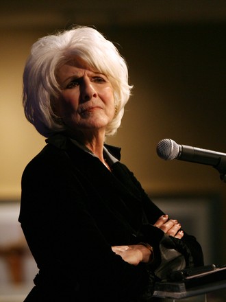 National Public Radio host Diane Rehm listens to a question from a fan during a question and answer period at a fund raising dinner for the local NPR affliate radio station in St. Louis on March 3, 2008.