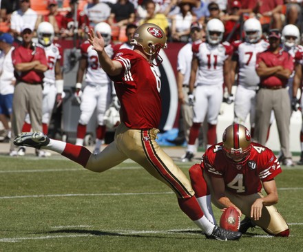 Kicker Joe Nedney and holder Andy Lee of the San Francisco 49ers