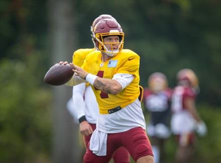 August 15, 2021: Washington Football Team runningback Jaret Patterson (35)  works on ball security drills during the team's NFL football training camp  practice at the Washington Football Team Facilities in Ashburn, Virginia