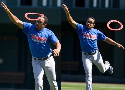 Chicago Cubs manager Lou Piniella (C) chases second base umpire Chris  Guccione while trailed by first base umpire Jim Reynolds during the second  inning against the Colorado Rockies at Coors Field in