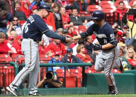 Milwaukee Brewers Ryan Braun gets a handshake from third base coach Brad Fisher after hitting a two run home run against the St. Louis Cardinals in the first inning at Busch Stadium in St. Louis on October 3, 2009.  Braun reaches the 200-hit plateau for the first time in his career with the homer as Milwaukee won the game 5-4.