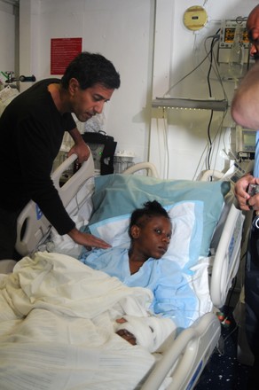 Dr. Sanjay Gupta performs brain surgery on Haitian girl, Port-Au-Prince, Haiti - 18 Jan 2010