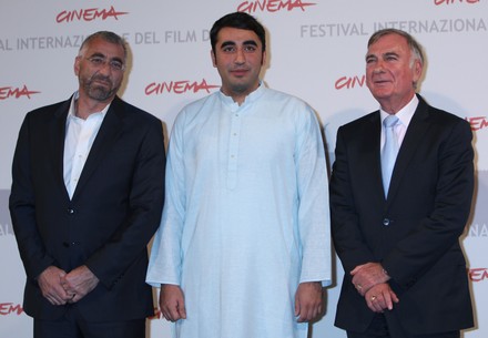 Duane Baughman (L), Bilawal Bhutto Zardari (C) and Mark Siegel arrive at a photocall for the film "Bhutto" during the 5th Rome International Film Festival in Rome on October 30, 2010.