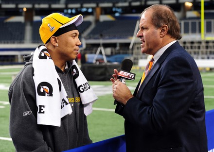 Green Bay Packers linebacker A.J. Hawk wears a Cheesehead hat during  Media Day for Super Bowl XLV in Arlington, Texas on February 1, 2011. The  Pittsburgh Steelers will take on the Green