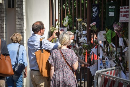 People waiting for the opening of the funeral home of Gino Strada, Milan, Italy - 21 Aug 2021