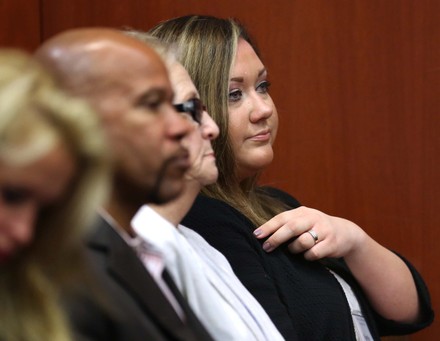 Shelly Zimmerman (far right) watches proceedings in her husband's trial  during the third day of jury selection in Seminole circuit court,  Sanford, Florida,  June 12, 2013.  George Zimmerman is accused of second degree murder in the fatal shooting of Trayvon Martin.