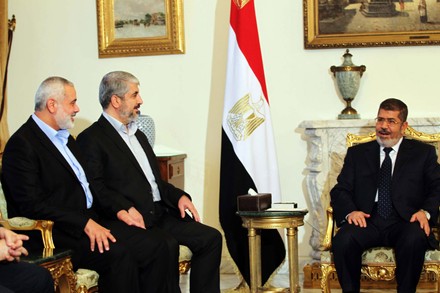 Egyptian President Mohamed Morsi meets Khalid Mashaal the Hamas Chief, And Gaza's Prime Minister Ismail Haniyeh, Cairo, Egypt - 19 Jun 2013